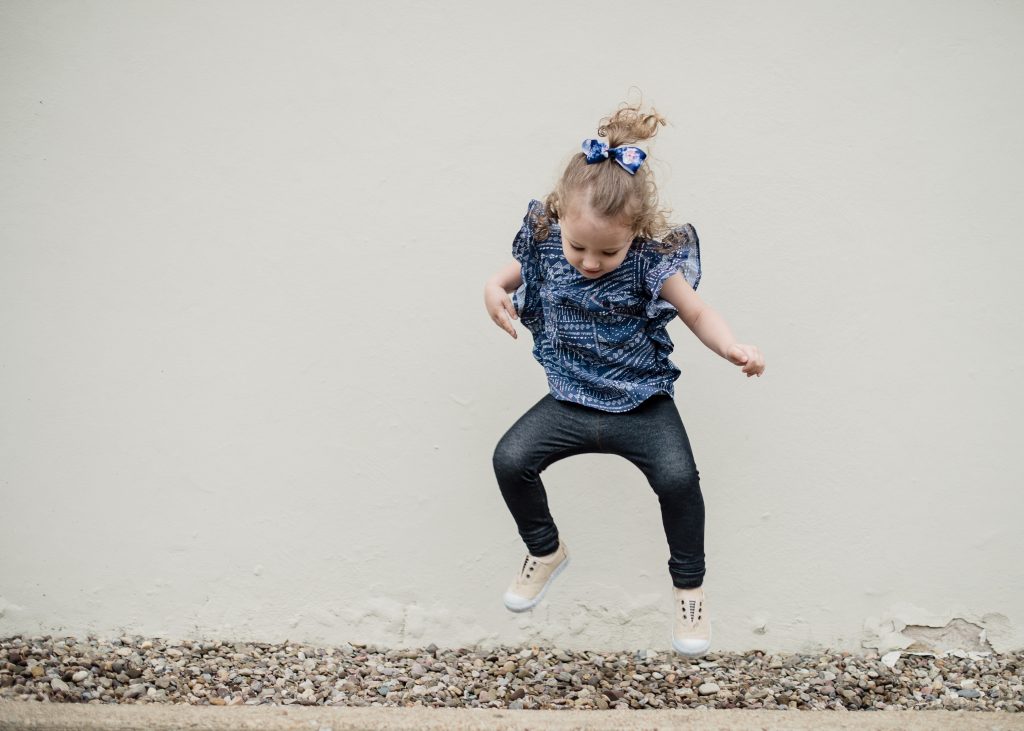 girl jumping, little girl jumping, daughter jumping