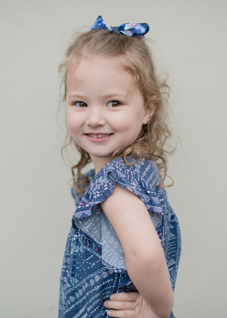 little girl profile, child smiling, portrait