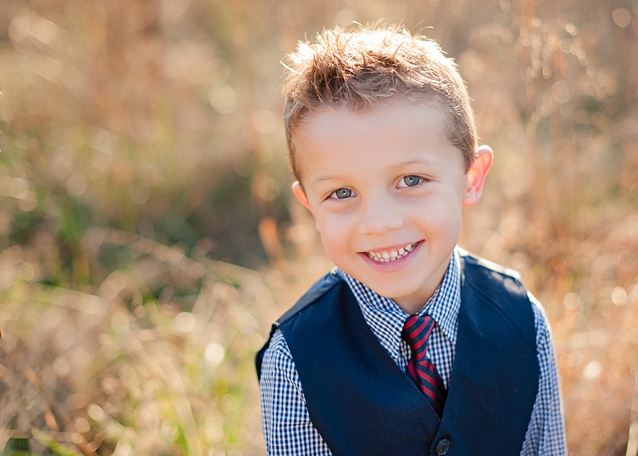 Little boy dapper dressed with big smile outdoor image