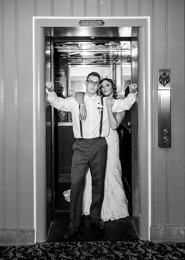 black and white shots of bride and groom in antique elevator at LAFAYETTE hotel in Marietta, Ohio
