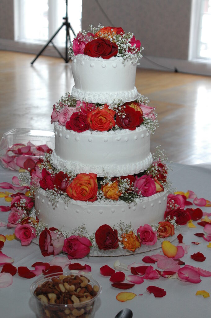 Village Bakery wedding cake with colorful roses