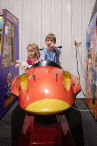 kids ride together at thomas family entertainment 