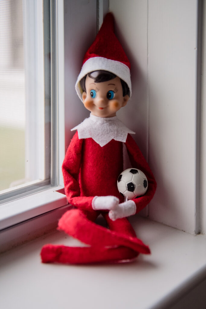 Elf on the shelf with soccer ball